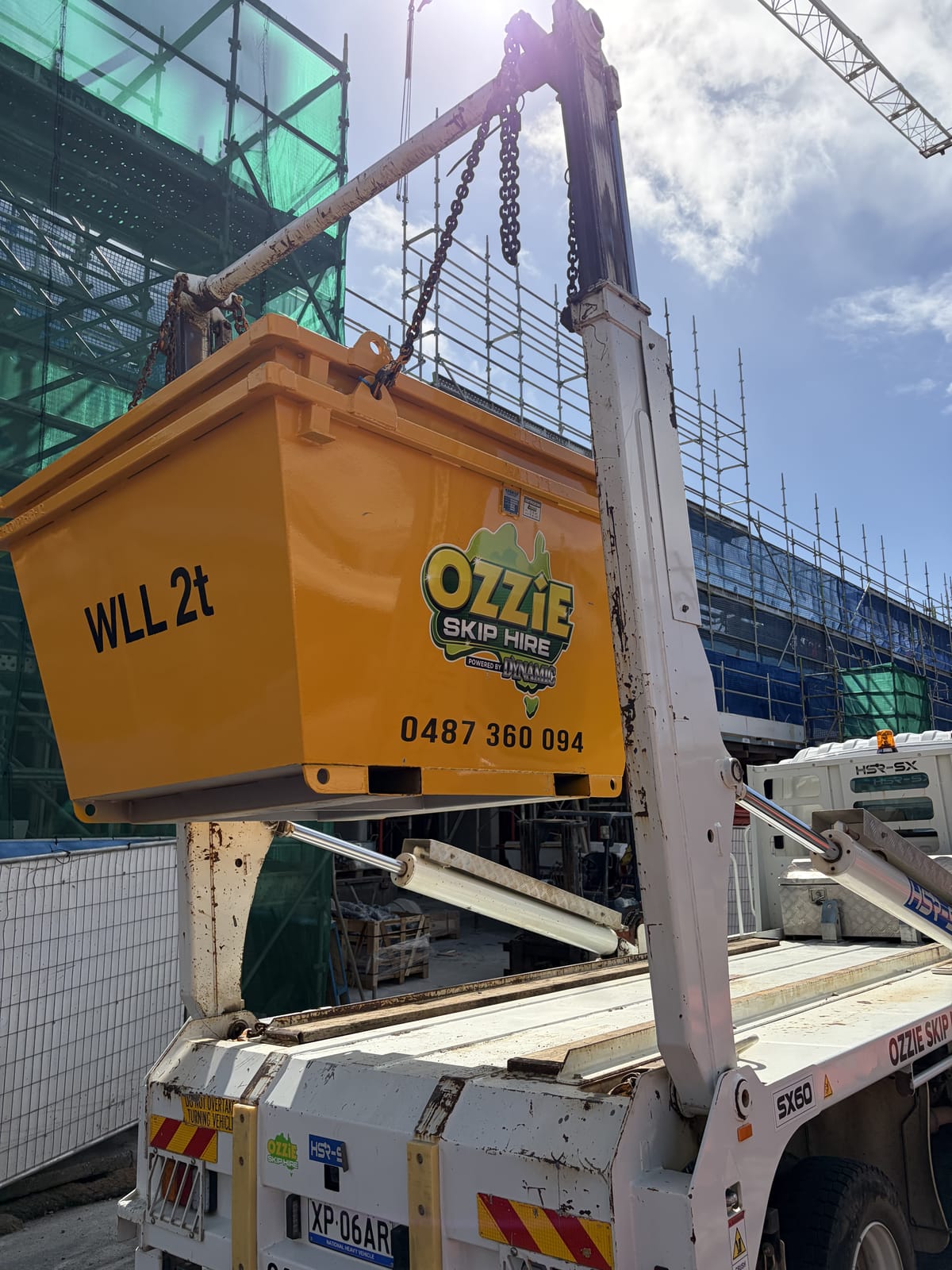 Ozzie Skip Hire crane-lift bin at a commercial construction project in Coffs Harbour