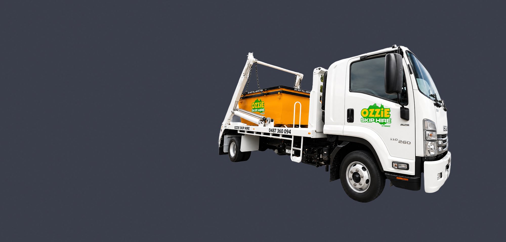 Ozzie Skip Hire skip truck carrying a yellow skip bin